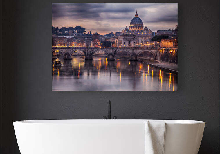 Illuminated bridge in Rome Italy. Saint Peters basilica in the background. by artvi