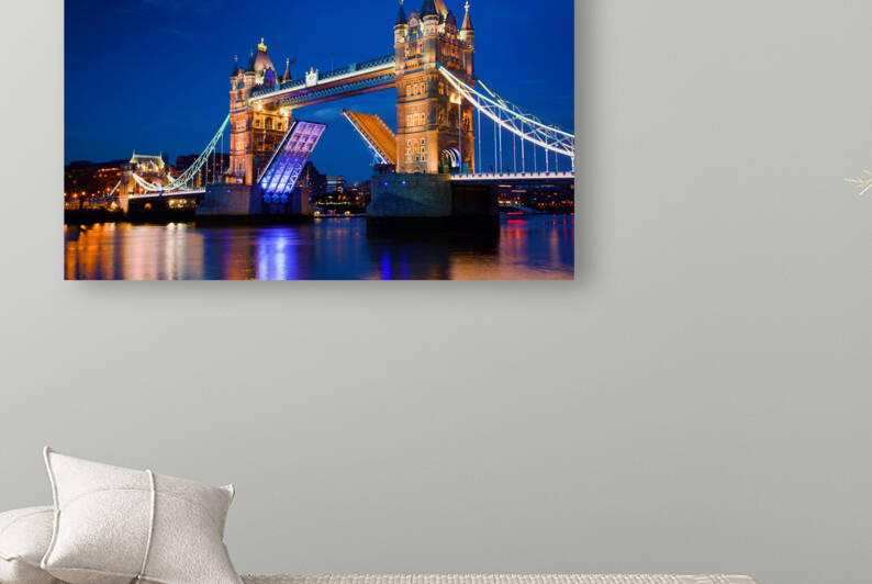 Tower Bridge in London the UK at night. The bridge is opening by artvi