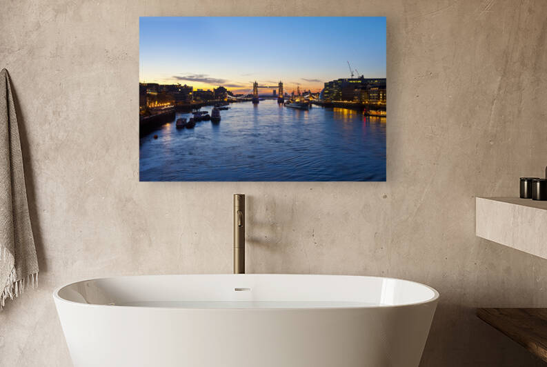 London sunrise with Tower Bridge City Hall HMS Belfast and the River Thames in the foreground. by artvi
