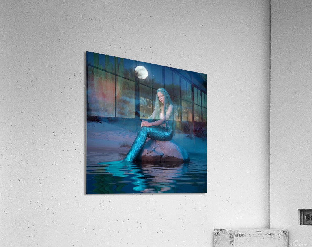 a photo of a mermaid with long green hair sitting by Amazantah Wall Art
