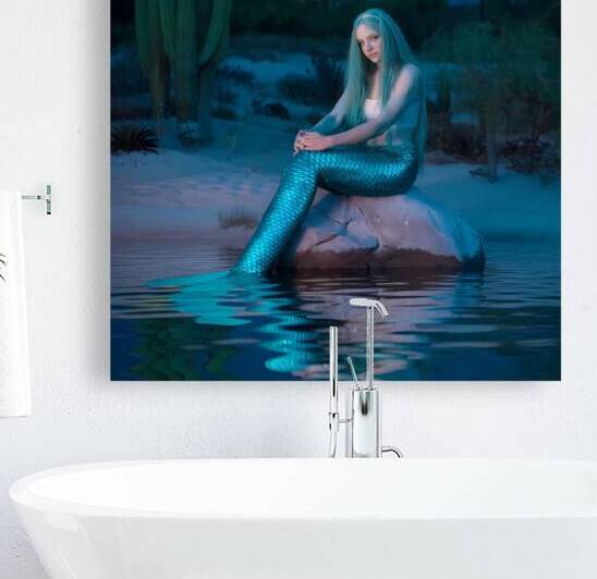 a photo of a mermaid with long green hair sitting by Amazantah