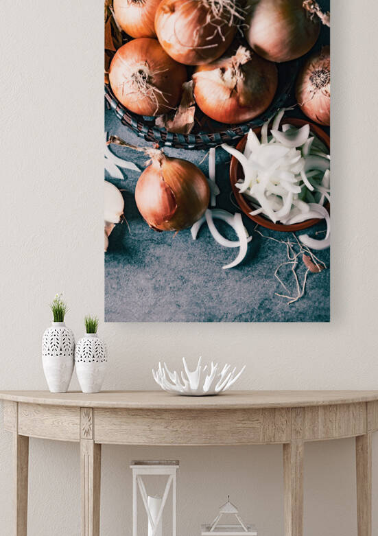 Brown onions and slices on wooden cutting board.Healthy food. by Carlos Castilla