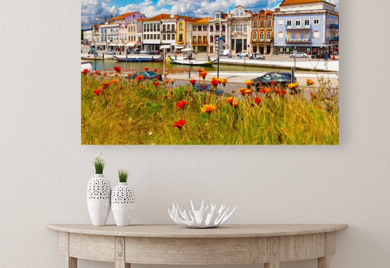 Traditional boats on the canal in Aveiro.Portugal. by Carlos Castilla
