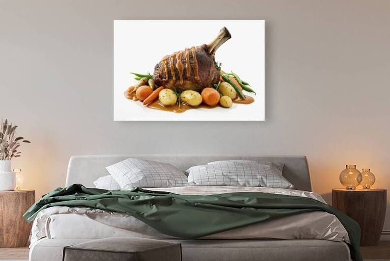 a perfectly cooked leg of lamb or lamb shank surr by Florin Harsan