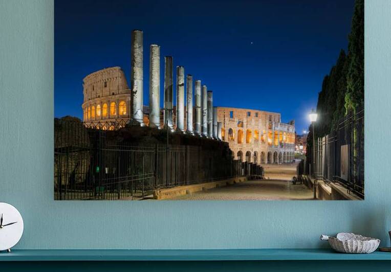 Night view of the Colosseum from the Via Sacra in Rome Italy. by Giuseppe Colasanto