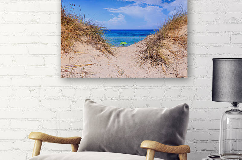 Umbrella isolated between sea dunes in Apulia Italy.  by Giuseppe Colasanto