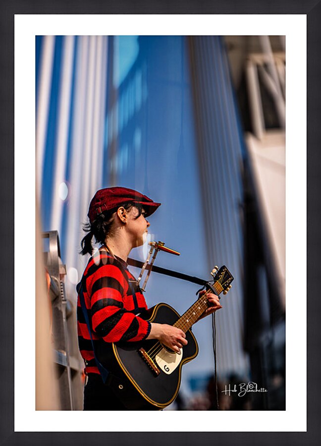 Busker on Provencher Bridge Winnipeg Manitoba Cadre photo
