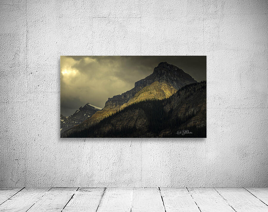 Sunset Casting A Glow on Mountain Peak In Lake Louise Alberta Canada Wall Preview