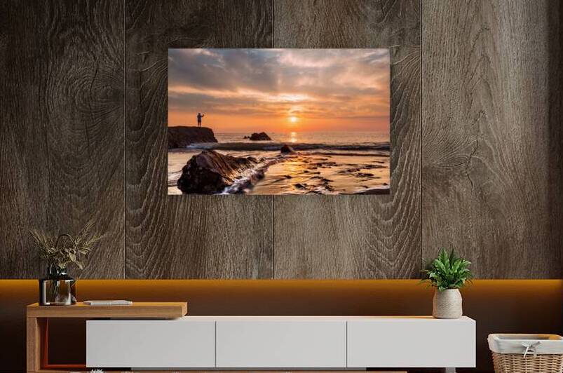 Widemouth bay sunset with lone fisherman by maggie mccall