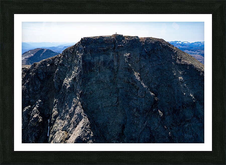 Standing Tall Atop a Rock Wall Picture Frame print