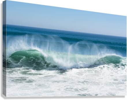 Wave crest breaking along beach Canvas Print