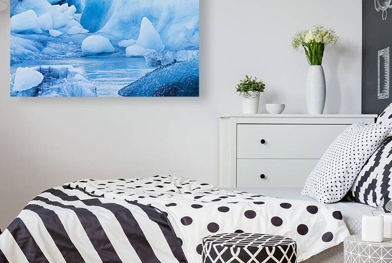 Icebergs floating in Jokulsarlon glacial lagoon by Joe Belanger