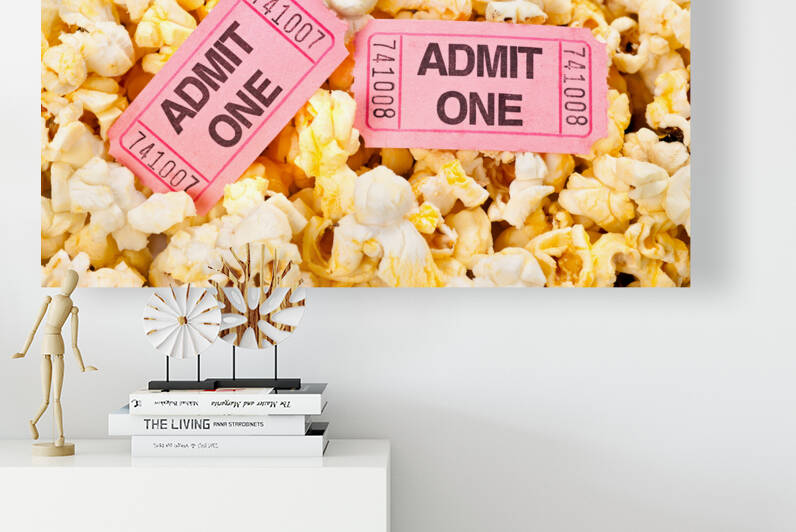 Movie tickets and popcorn by Joe Belanger