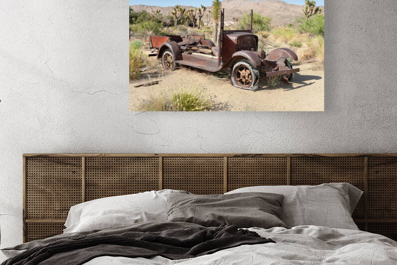 Abandoned car in desert by Joe Belanger