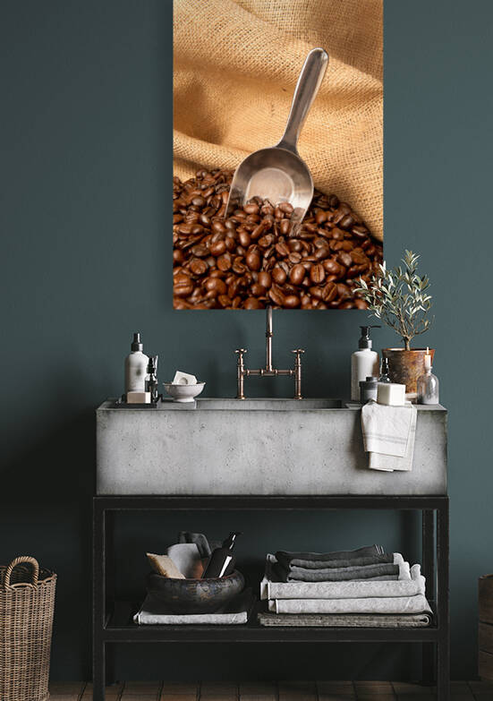 Coffee beans in burlap sack with scoop by Joe Belanger