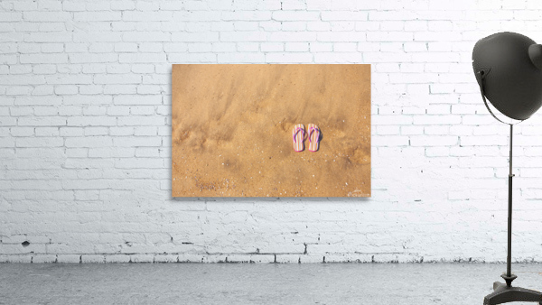 Flip flops on sand Wall Preview