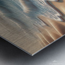 A serene beach scene featuring gentle ocean waves Metal print