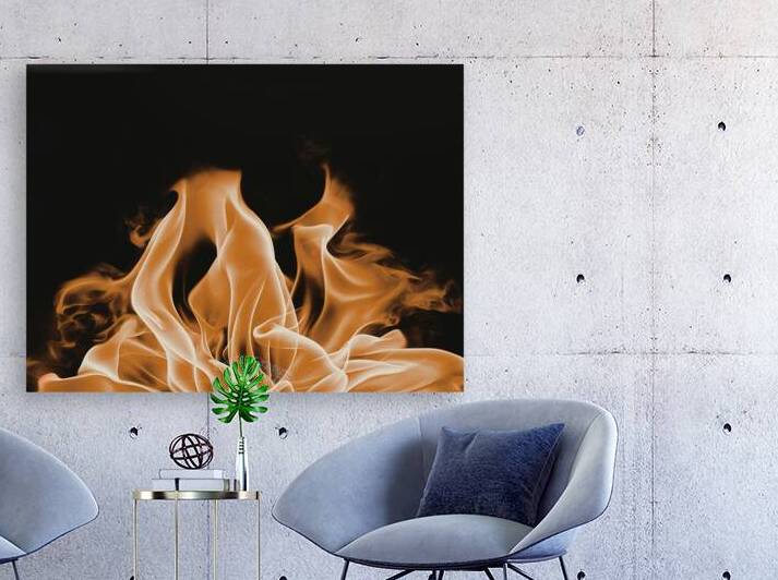 large orange flame on a black background by Iremia Tudor