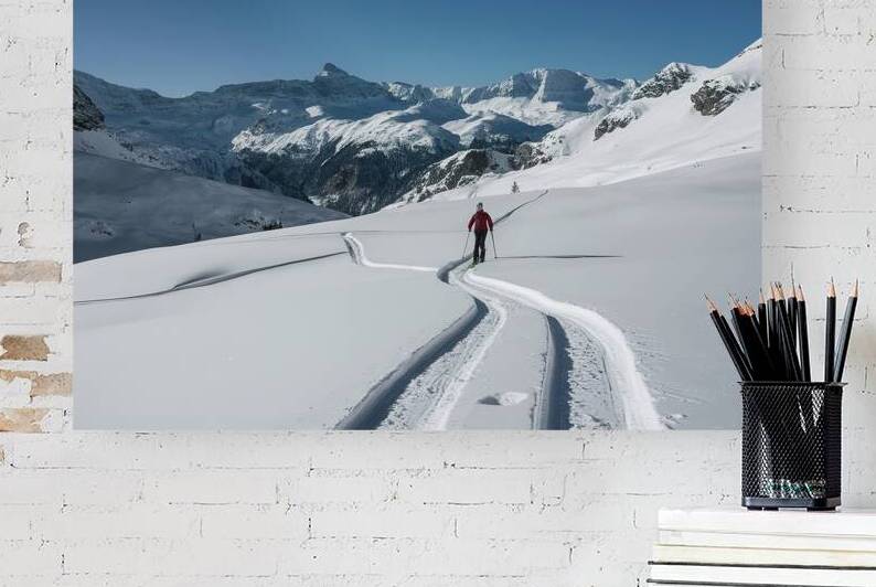 Skier tracks in fresh snow alone on the italian a by Iremia Tudor