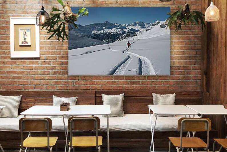 Skier tracks in fresh snow alone on the italian a by Iremia Tudor