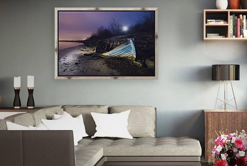 Old boat on Copenhagen shore at night  by Dalius Baranauskas