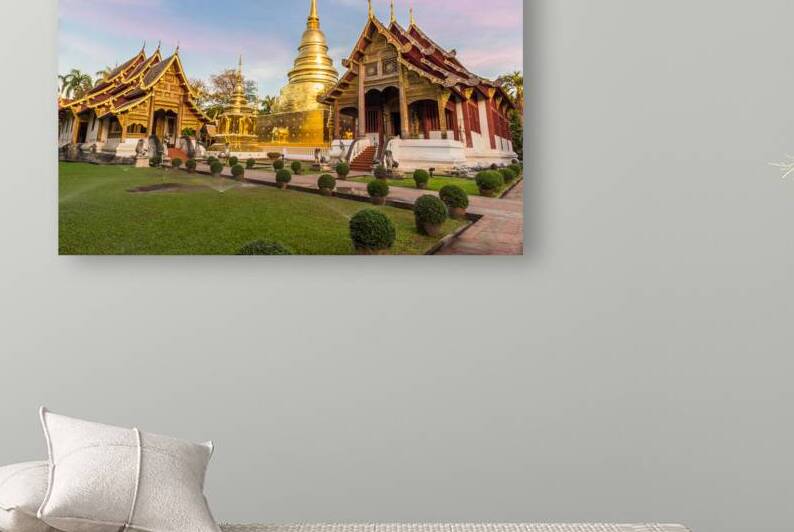 Wat Phra Singh temple and bright blue sky. Chiang Mai Thailand. by Maksim Zabarovskii