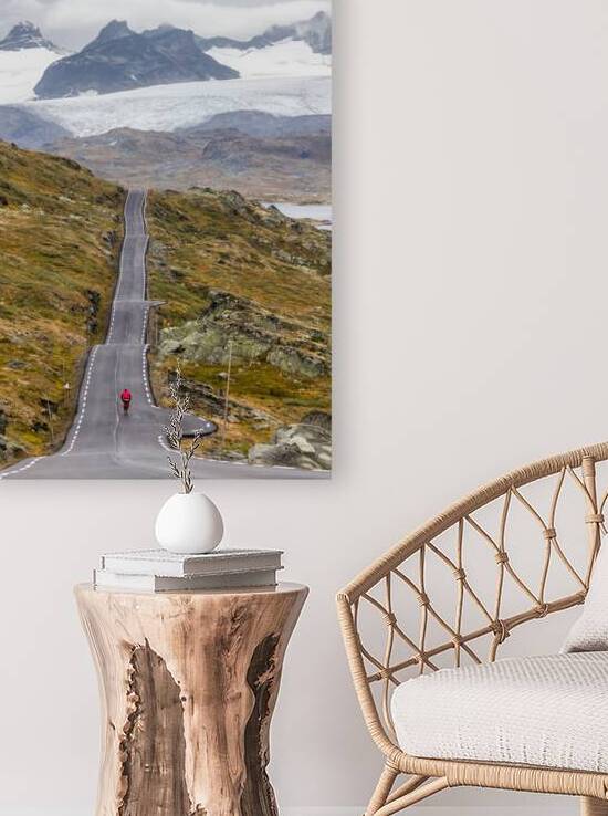 Cyclist on mountain road in Norway by Maksim Zabarovskii