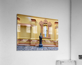 Statues on a Yellow Wall Acrylic Print