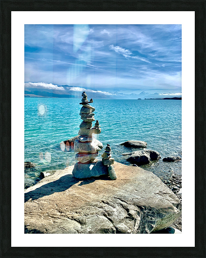 Rock Balancing in Front of the Lake Picture Frame print