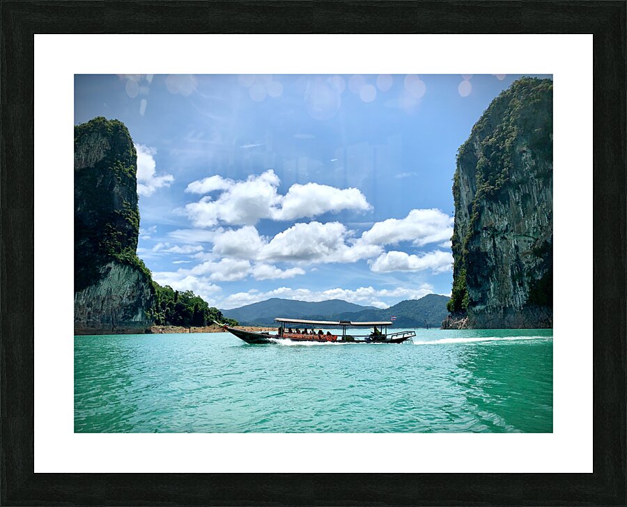 Boat Between Massive Rocks Picture Frame print