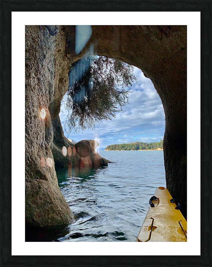 Kayaking Out of a Cave Picture Frame print