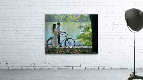 Newlyweds by the Lake with a Bicycle Wall Preview
