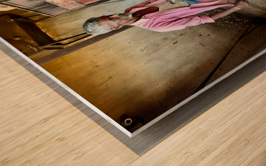 Man Fuelling Up the Fire Wood print