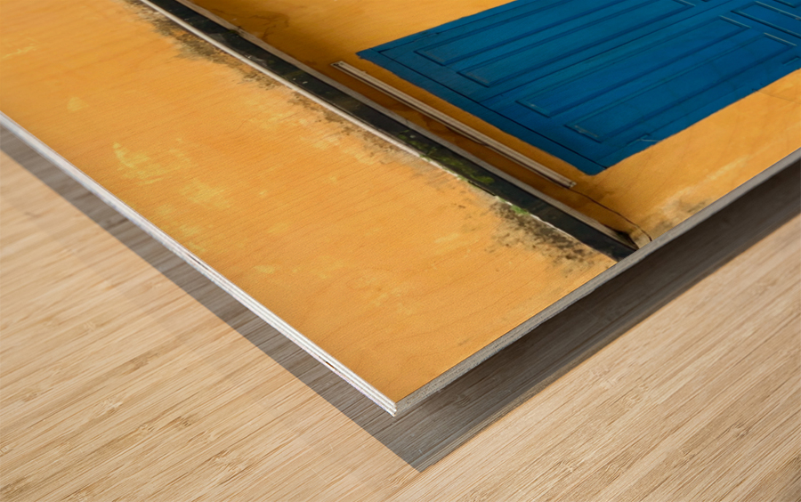 The Yellow House with Blue Windows and Door Wood print