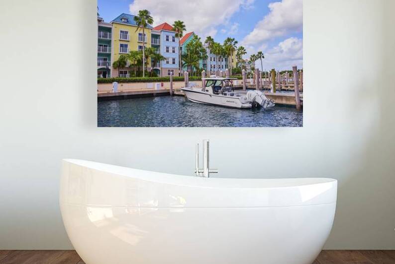 Tropical Marina with Leisure Boat and Colorful Buildings by Nicholas J Klein