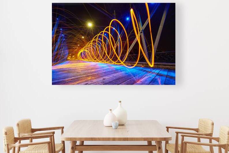 Twisting ring of yellow light on the Wells Street Bridge in Fort by Nicholas J Klein