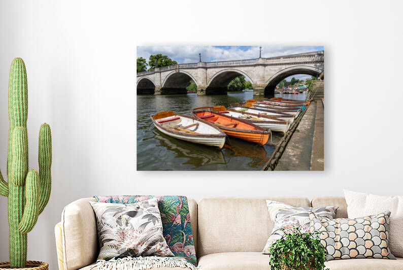 Wooden boats for hire moored on the River Thames by Milton Cogheil