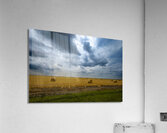 Hay Bales Under a Cloudy Sky Acrylic Print