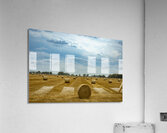 Hay Bales Under a Cloudy Sky Acrylic Print