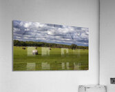 Haybales Under a Cloudy Sky Acrylic Print