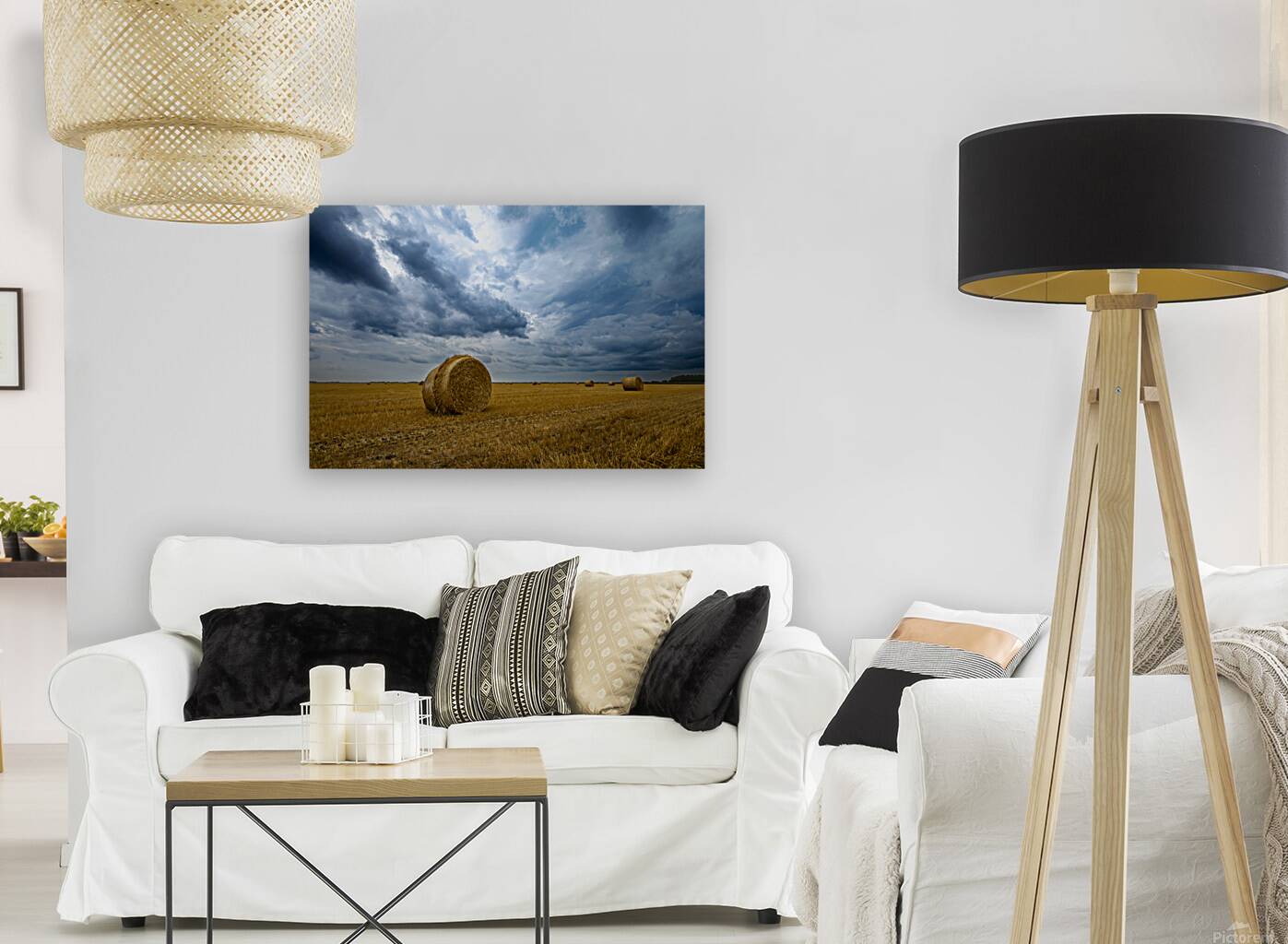 Hay Bales Under a Cloudy Sky Reproduction