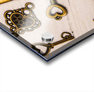 Metal keys of different size on wooden table Acrylic print