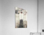 Vintage snowboarding man carrying board in snow Acrylic Print