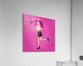 Smiling female model dancing in falling rain Acrylic Print