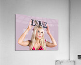 Woman holding love sign Acrylic Print