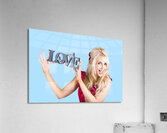 Fun blonde woman with love word sign Acrylic Print