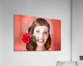 Woman gripping red rose between her teeth Acrylic Print
