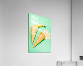 Whole bannana and slices placed in ice cream cone Acrylic Print