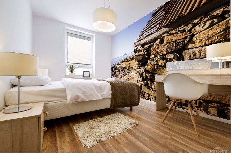 Old stone coastal boat house Mural print