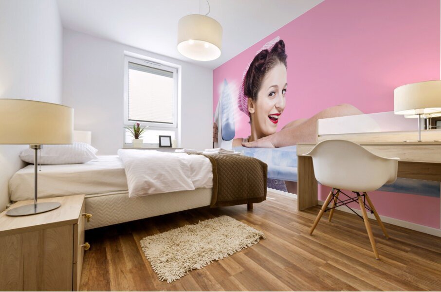 Smiling housewife doing housework laundry duties Mural print